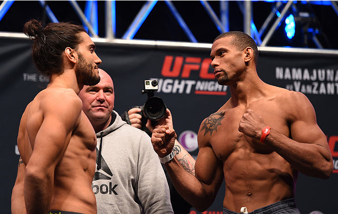LAS VEGAS, NV - DECEMBER 09: (L-R) Opponents Elias Theodorou of Canada and Thiago Santos of Brazil face off during the UFC Fight Night weigh-in inside MGM Grand Garden Arena on December 9, 2015 in Las Vegas, Nevada. (Photo by Josh Hedges/Zuffa LLC/Zuffa