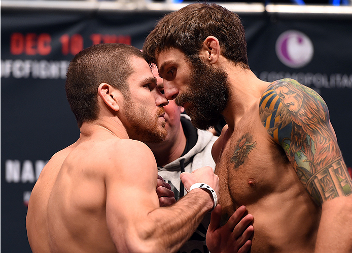 LAS VEGAS, NV - DECEMBER 09: (L-R) Opponents Jim Miller and Michael Chiesa face off during the UFC Fight Night weigh-in inside MGM Grand Garden Arena on December 9, 2015 in Las Vegas, Nevada. (Photo by Josh Hedges/Zuffa LLC/Zuffa LLC via Getty Images)