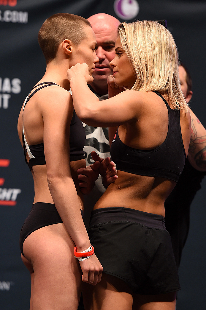 LAS VEGAS, NV - DECEMBER 09: (L-R) Opponents Rose Namajunas and Paige VanZant face off during the UFC Fight Night weigh-in inside MGM Grand Garden Arena on December 9, 2015 in Las Vegas, Nevada. (Photo by Josh Hedges/Zuffa LLC/Zuffa LLC via Getty Images