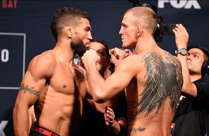 CHICAGO, IL - JULY 22: (L-R) Opponents Jim Alers and Jason Knight face off during the UFC weigh-in at the United Center on July 22, 2016 in Chicago, Illinois. (Photo by Josh Hedges/Zuffa LLC/Zuffa LLC via Getty Images)