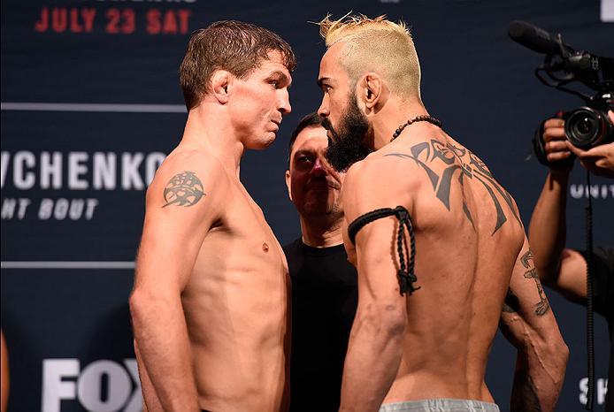 CHICAGO, IL - JULY 22: (L-R) Opponents Darren Elkins and Godofredo Pepey of Brazil face off during the UFC weigh-in at the United Center on July 22, 2016 in Chicago, Illinois. (Photo by Josh Hedges/Zuffa LLC/Zuffa LLC via Getty Images)