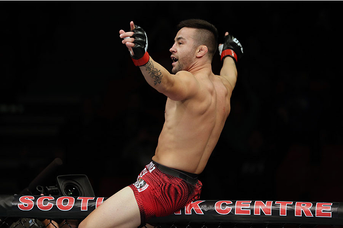 HALIFAX, NS - OCTOBER 4: Pedro Munhoz of Brazil celebrates after defeating Jerrod Sanders in their bantamweight bout at the Scotiabank Centre on October 4, 2014 in Halifax, Nova Scotia, Canada. (Photo by Nick Laham/Zuffa LLC/Zuffa LLC via Getty Images)