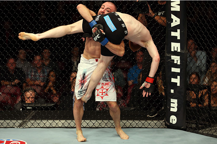 HALIFAX, NS - OCTOBER 4: (L-R) Chris Kelades of Canada attempts a takedown against Patrick Holohan of Ireland in their flyweight bout at the Scotiabank Centre on October 4, 2014 in Halifax, Nova Scotia, Canada. (Photo by Nick Laham/Zuffa LLC/Zuffa LLC vi