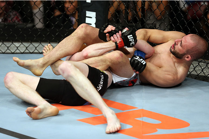 HALIFAX, NS - OCTOBER 4: (R-L) Chris Kelades of Canada attempts a submission against Patrick Holohan of Ireland in their flyweight bout at the Scotiabank Centre on October 4, 2014 in Halifax, Nova Scotia, Canada. (Photo by Nick Laham/Zuffa LLC/Zuffa LLC