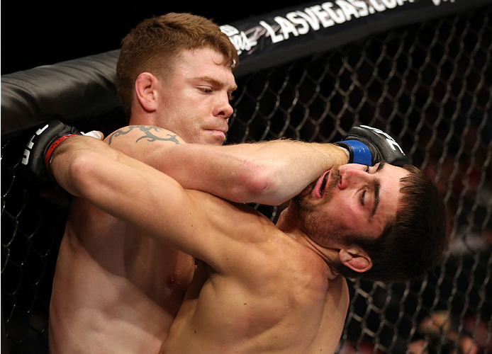 HALIFAX, NS - OCTOBER 4: (L-R) Paul Felder lands an elbow to the chin of Jason Saggo of Canada in their lightweight bout at the Scotiabank Centre on October 4, 2014 in Halifax, Nova Scotia, Canada. (Photo by Nick Laham/Zuffa LLC/Zuffa LLC via Getty Image