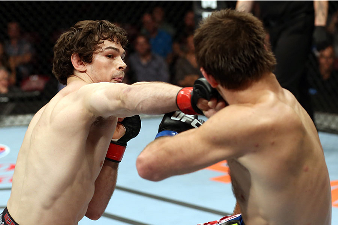HALIFAX, NS - OCTOBER 4: (L-R) Olivier Aubin-Mercier of Canada punches Jake Lindsey in their welterweight bout at the Scotiabank Centre on October 4, 2014 in Halifax, Nova Scotia, Canada. (Photo by Nick Laham/Zuffa LLC/Zuffa LLC via Getty Images)