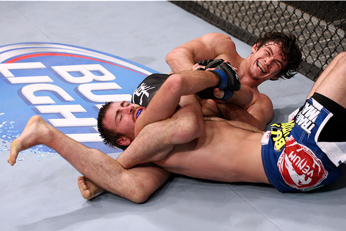 HALIFAX, NS - OCTOBER 4: (R-L) Olivier Aubin-Mercier of Canada submits Jake Lindsey in their welterweight bout at the Scotiabank Centre on October 4, 2014 in Halifax, Nova Scotia, Canada. (Photo by Nick Laham/Zuffa LLC/Zuffa LLC via Getty Images)