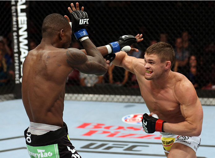 HALIFAX, NS - OCTOBER 4: (R-L) Daron Cruickshank punches Anthony Njokuani in their lightweight bout at the Scotiabank Centre on October 4, 2014 in Halifax, Nova Scotia, Canada. (Photo by Nick Laham/Zuffa LLC/Zuffa LLC via Getty Images)