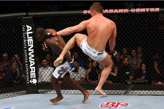 HALIFAX, NS - OCTOBER 4: (R-L) Daron Cruickshank kicks Anthony Njokuani in their lightweight bout at the Scotiabank Centre on October 4, 2014 in Halifax, Nova Scotia, Canada. (Photo by Nick Laham/Zuffa LLC/Zuffa LLC via Getty Images)