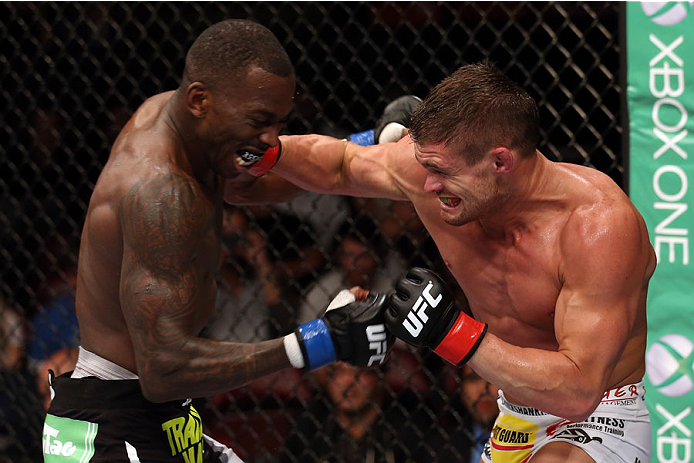 HALIFAX, NS - OCTOBER 4: (R-L) Daron Cruickshank punches Anthony Njokuani in their lightweight bout at the Scotiabank Centre on October 4, 2014 in Halifax, Nova Scotia, Canada. (Photo by Nick Laham/Zuffa LLC/Zuffa LLC via Getty Images)