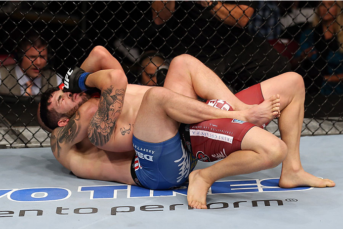 HALIFAX, NS - OCTOBER 4: (L-R) Mitch Gagnon of Canada submits Roman Salazar by rear naked choke in their bantamweight bout at the Scotiabank Centre on October 4, 2014 in Halifax, Nova Scotia, Canada. (Photo by Nick Laham/Zuffa LLC/Zuffa LLC via Getty Ima