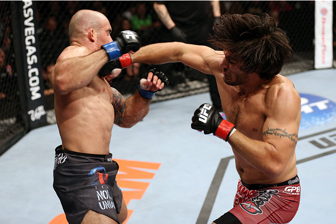HALIFAX, NS - OCTOBER 4: (R-L) Elias Theodorou of Canada punches Bruno Santos of Brazil in their middleweight bout at the Scotiabank Centre on October 4, 2014 in Halifax, Nova Scotia, Canada. (Photo by Nick Laham/Zuffa LLC/Zuffa LLC via Getty Images)