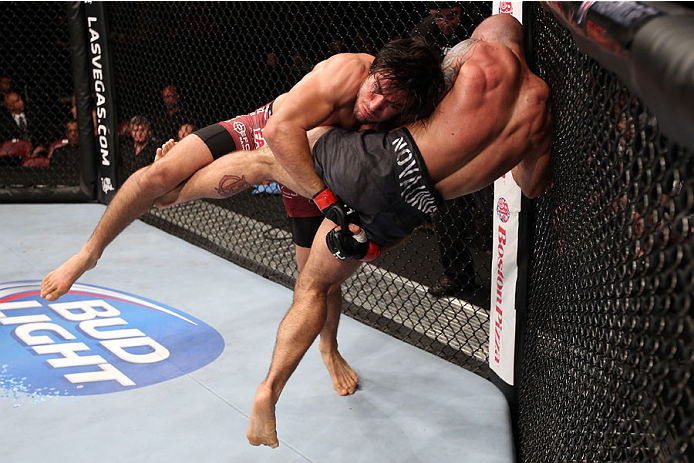 HALIFAX, NS - OCTOBER 4: (L-R) Elias Theodorou of Canada takes down Bruno Santos of Brazil in their middleweight bout at the Scotiabank Centre on October 4, 2014 in Halifax, Nova Scotia, Canada. (Photo by Nick Laham/Zuffa LLC/Zuffa LLC via Getty Images)