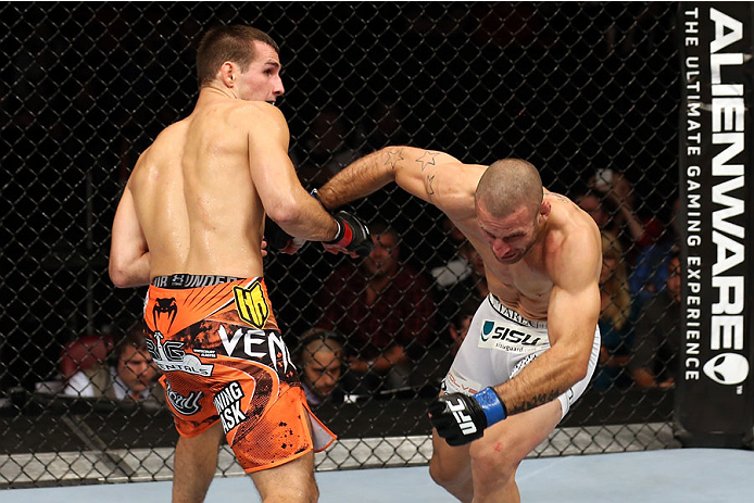 HALIFAX, NS - OCTOBER 4: (L-R) Rory MacDonald of Canada knocks out Tarec Saffiedine of Belgium in their welterweight bout at the Scotiabank Centre on October 4, 2014 in Halifax, Nova Scotia, Canada. (Photo by Nick Laham/Zuffa LLC/Zuffa LLC via Getty Imag