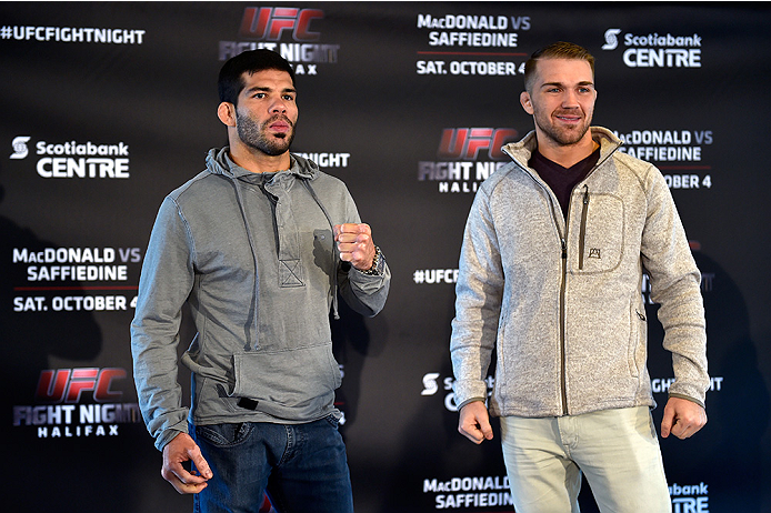 HALIFAX, NS - OCTOBER 2: (L-R) Raphael Assuncao and Bryan Caraway face off during the UFC Fight Night Ultimate Media Day on October 2, 2014 in Halifax, Nova Scotia, Canada. (Photo by Jeff Bottari/Zuffa LLC/Zuffa LLC via Getty Images)