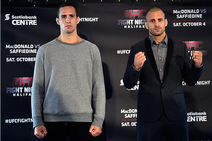 HALIFAX, NS - OCTOBER 2: (L-R) Rory MacDonald and Tarec Saffiedine pose for the media during the UFC Fight Night Ultimate Media Day on October 2, 2014 in Halifax, Nova Scotia, Canada. (Photo by Jeff Bottari/Zuffa LLC/Zuffa LLC via Getty Images)