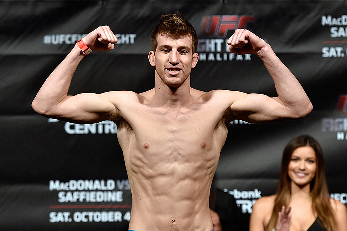 HALIFAX, NS - OCTOBER 3: Matt Dwyer of Canada steps on the scale during the UFC Fight Night weigh-in at the Scotiabank Centre on October 3, 2014 in Halifax, Nova Scotia, Canada. (Photo by Jeff Bottari/Zuffa LLC/Zuffa LLC via Getty Images)