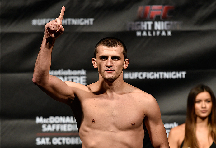 HALIFAX, NS - OCTOBER 3: Albert Tumenov of Russia steps on the scale during the UFC Fight Night weigh-in at the Scotiabank Centre on October 3, 2014 in Halifax, Nova Scotia, Canada. (Photo by Jeff Bottari/Zuffa LLC/Zuffa LLC via Getty Images)