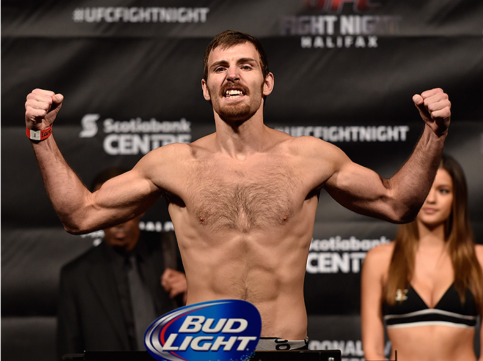 HALIFAX, NS - OCTOBER 3: Jake Lindsey of the United States steps on the scale during the UFC Fight Night weigh-in at the Scotiabank Centre on October 3, 2014 in Halifax, Nova Scotia, Canada. (Photo by Jeff Bottari/Zuffa LLC/Zuffa LLC via Getty Images)