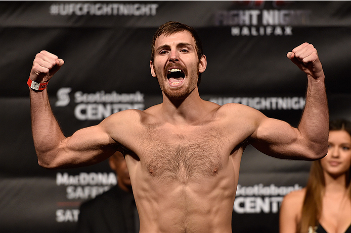 HALIFAX, NS - OCTOBER 3: Jake Lindsey of the United States steps on the scale during the UFC Fight Night weigh-in at the Scotiabank Centre on October 3, 2014 in Halifax, Nova Scotia, Canada. (Photo by Jeff Bottari/Zuffa LLC/Zuffa LLC via Getty Images)