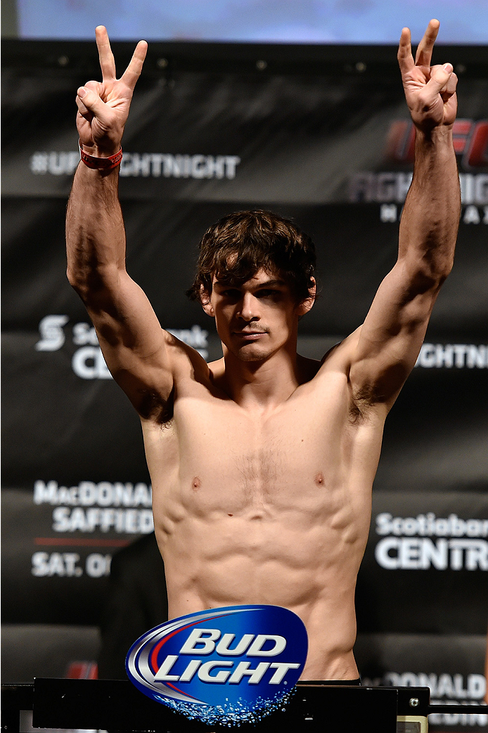 HALIFAX, NS - OCTOBER 3: Olivier Aubin-Mercier of Canada steps on the scale during the UFC Fight Night weigh-in at the Scotiabank Centre on October 3, 2014 in Halifax, Nova Scotia, Canada. (Photo by Jeff Bottari/Zuffa LLC/Zuffa LLC via Getty Images)