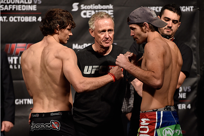 HALIFAX, NS - OCTOBER 3: (L-R) Olivier Aubin-Mercier of Canada and Jake Lindsey of the United States face off during the UFC Fight Night weigh-in at the Scotiabank Centre on October 3, 2014 in Halifax, Nova Scotia, Canada. (Photo by Jeff Bottari/Zuffa LL