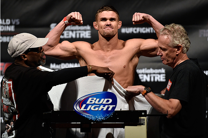 HALIFAX, NS - OCTOBER 3: Daron Cruickshank of the United States steps on the scale during the UFC Fight Night weigh-in at the Scotiabank Centre on October 3, 2014 in Halifax, Nova Scotia, Canada. (Photo by Jeff Bottari/Zuffa LLC/Zuffa LLC via Getty Imag