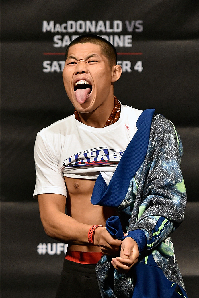 HALIFAX, NS - OCTOBER 3: Li Jingliang of China walks onstage during the UFC Fight Night weigh-in at the Scotiabank Centre on October 3, 2014 in Halifax, Nova Scotia, Canada. (Photo by Jeff Bottari/Zuffa LLC/Zuffa LLC via Getty Images)