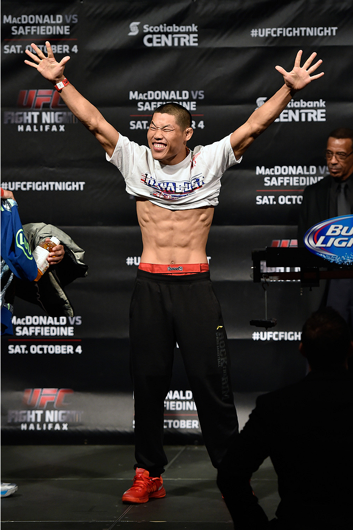 HALIFAX, NS - OCTOBER 3: Li Jingliang of China walks onstage during the UFC Fight Night weigh-in at the Scotiabank Centre on October 3, 2014 in Halifax, Nova Scotia, Canada. (Photo by Jeff Bottari/Zuffa LLC/Zuffa LLC via Getty Images)