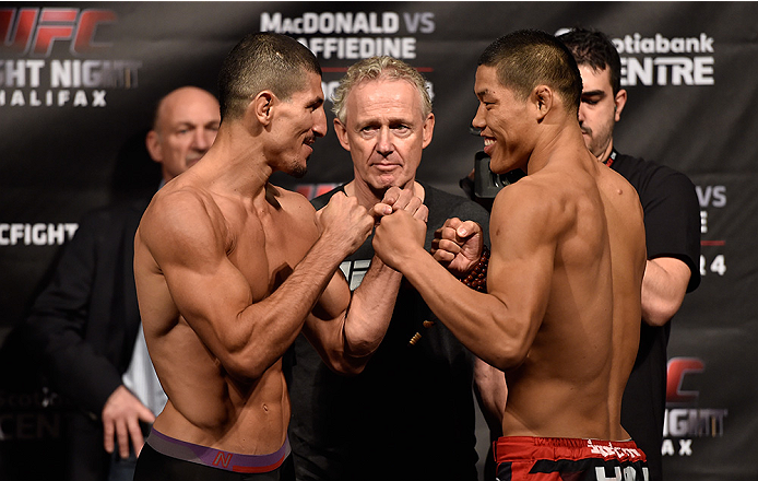 HALIFAX, NS - OCTOBER 3: (L-R) Nordine Taleb and Li Jingliang face off during the UFC Fight Night weigh-in at the Scotiabank Centre on October 3, 2014 in Halifax, Nova Scotia, Canada. (Photo by Jeff Bottari/Zuffa LLC/Zuffa LLC via Getty Images)