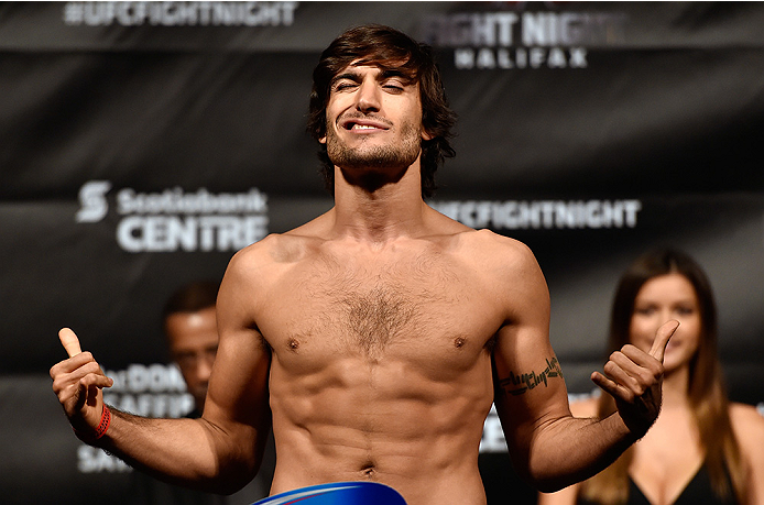 HALIFAX, NS - OCTOBER 3: Elias Theodorou of Canada steps on the scale during the UFC Fight Night weigh-in at the Scotiabank Centre on October 3, 2014 in Halifax, Nova Scotia, Canada. (Photo by Jeff Bottari/Zuffa LLC/Zuffa LLC via Getty Images)