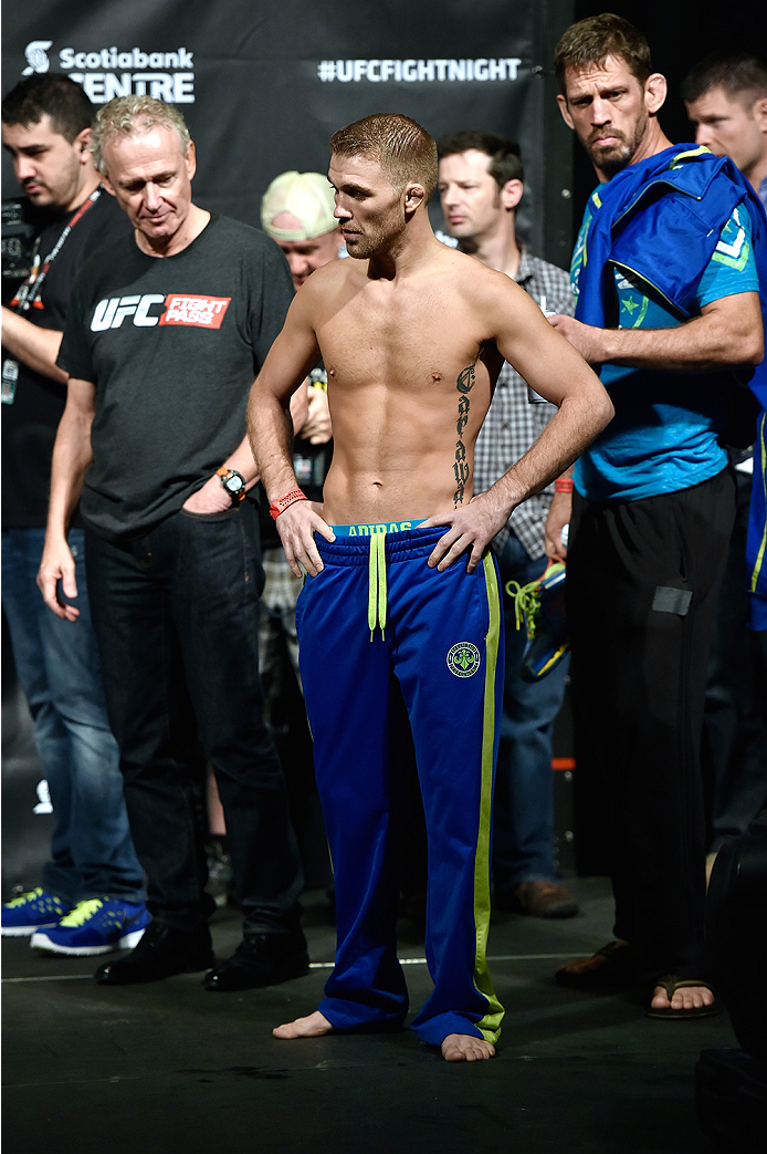 HALIFAX, NS - OCTOBER 3: Bryan Caraway of the United States stands on stage during the UFC Fight Night weigh-in at the Scotiabank Centre on October 3, 2014 in Halifax, Nova Scotia, Canada. (Photo by Jeff Bottari/Zuffa LLC/Zuffa LLC via Getty Images)