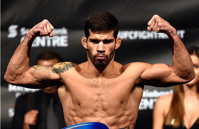 HALIFAX, NS - OCTOBER 3: Raphael Assuncao of Brazil steps on the scale during the UFC Fight Night weigh-in at the Scotiabank Centre on October 3, 2014 in Halifax, Nova Scotia, Canada. (Photo by Jeff Bottari/Zuffa LLC/Zuffa LLC via Getty Images)