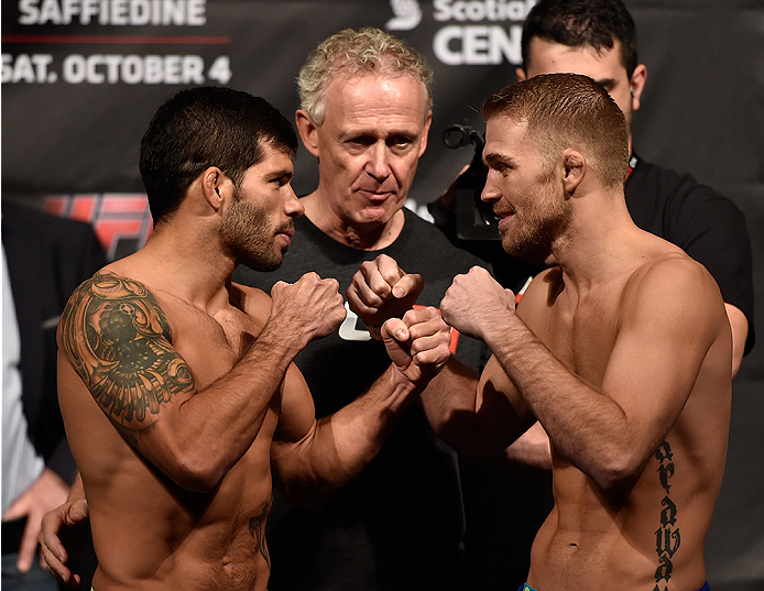 HALIFAX, NS - OCTOBER 3: (L-R) Raphael Assuncao and Bryan Caraway face-off during the UFC Fight Night weigh-in at the Scotiabank Centre on October 3, 2014 in Halifax, Nova Scotia, Canada. (Photo by Jeff Bottari/Zuffa LLC/Zuffa LLC via Getty Images)