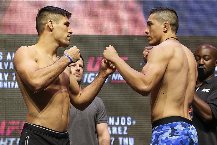 LAS VEGAS, NV - JULY 06: (L-R) Vicente Luque and Alvaro Herrera face off during the UFC Fight Night Weigh-in event at the T-Mobile Arena on July 6, 2016 in Las Vegas, Nevada. (Photo by Ed Mulholland/Zuffa LLC/Zuffa LLC via Getty Images)