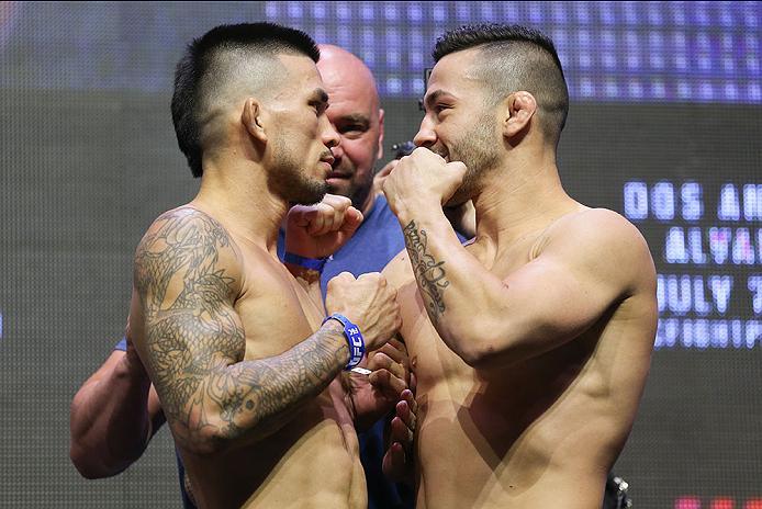 LAS VEGAS, NV - JULY 06: (L-R) Russell Doane and Pedro Munhoz face off during the UFC Fight Night Weigh-in event at the T-Mobile Arena on July 6, 2016 in Las Vegas, Nevada. (Photo by Ed Mulholland/Zuffa LLC/Zuffa LLC via Getty Images)