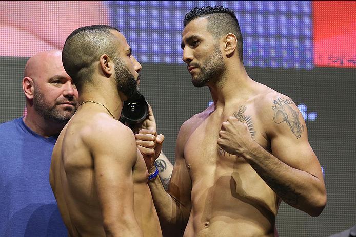 LAS VEGAS, NV - JULY 06: (L-R) John Makdessi and Mehdi Baghdad face off during the UFC Fight Night Weigh-in event at the T-Mobile Arena on July 6, 2016 in Las Vegas, Nevada. (Photo by Ed Mulholland/Zuffa LLC/Zuffa LLC via Getty Images)