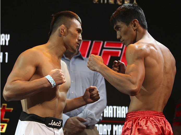 MACAU - FEBRUARY 28: (L and R) Jumabieke Tuerxun and Mark Eddiva face off during the UFC weigh-in event at the Venetian Macau on February 28, 2014 in Macau. (Photo by Mitch Viquez/Zuffa LLC/Zuffa LLC via Getty Images)