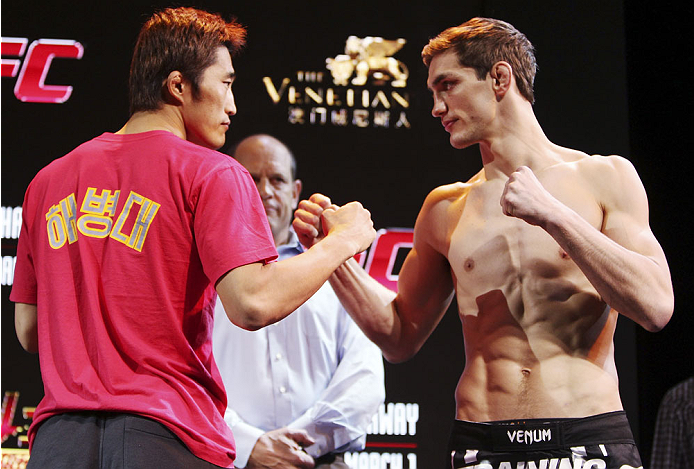 MACAU - FEBRUARY 28: (L and R) Dong Hyun Kim and John Hathaway face off during the UFC weigh-in event at the Venetian Macau on February 28, 2014 in Macau. (Photo by Mitch Viquez/Zuffa LLC/Zuffa LLC via Getty Images)