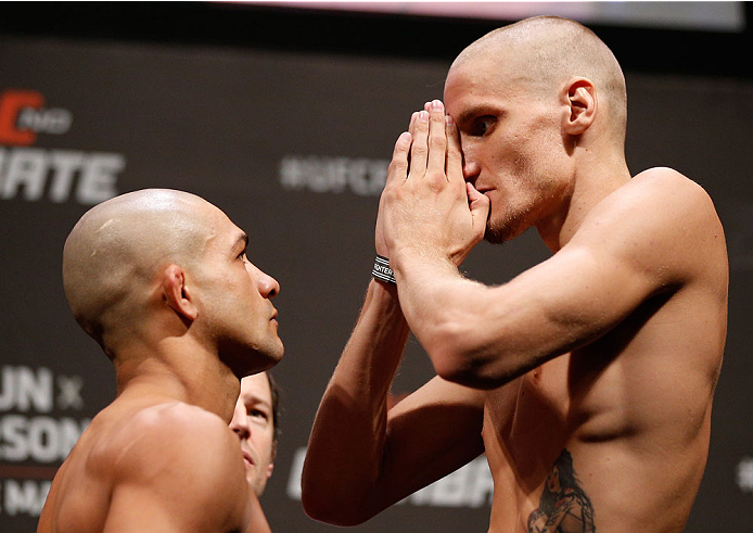 NATAL, BRAZIL - MARCH 22: (L-R) Opponents Diego Brandao and Will Chope face off during the UFC weigh-in at Ginasio Nelio Dias on March 22, 2014 in Natal, Brazil. (Photo by Josh Hedges/Zuffa LLC/Zuffa LLC via Getty Images)