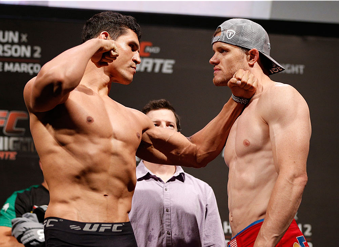 NATAL, BRAZIL - MARCH 22: (L-R) Opponents Cezar "Mutante" Ferreira and CB Dollaway face off during the UFC weigh-in at Ginasio Nelio Dias on March 22, 2014 in Natal, Brazil. (Photo by Josh Hedges/Zuffa LLC/Zuffa LLC via Getty Images)