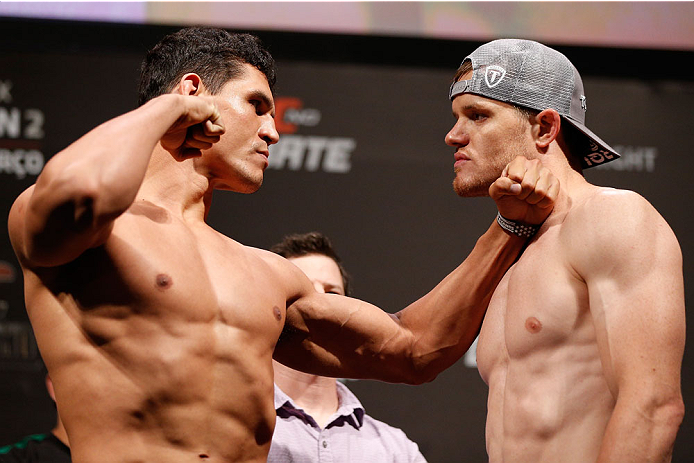 NATAL, BRAZIL - MARCH 22: (L-R) Opponents Cezar "Mutante" Ferreira and CB Dollaway face off during the UFC weigh-in at Ginasio Nelio Dias on March 22, 2014 in Natal, Brazil. (Photo by Josh Hedges/Zuffa LLC/Zuffa LLC via Getty Images)