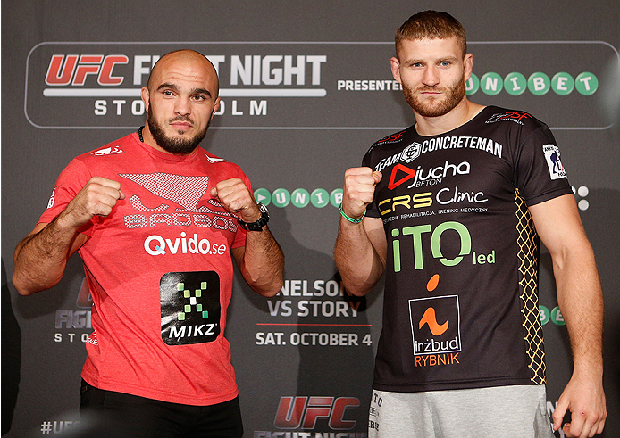 STOCKHOLM, SWEDEN - OCTOBER 01: (L-R) Opponents Ilir Latifi of Sweden and Jan Blachowicz of Poland pose for photos at the Grand Hotel on October 1, 2014 in Stockholm, Sweden. (Photo by Josh Hedges/Zuffa LLC/Zuffa LLC via Getty Images)