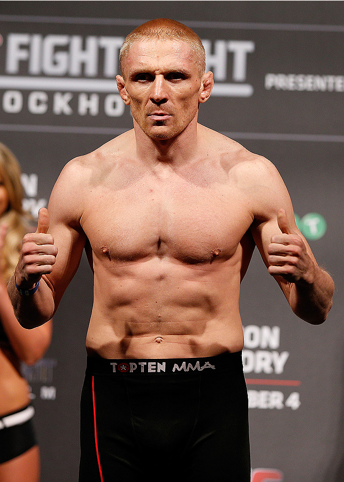 STOCKHOLM, SWEDEN - OCTOBER 03: Dennis Siver of Germany poses on the scale after weighing in during the UFC weigh-in at the Ericsson Globe Arena on October 3, 2014 in Stockholm, Sweden. (Photo by Josh Hedges/Zuffa LLC/Zuffa LLC)