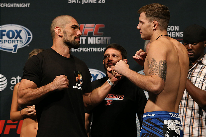 SAN ANTONIO, TX - JUNE 27: Marcelo Guimaraes (left) and Andy Enz (right) pose after weighing in for their UFC Fight Night bout at the AT&T Center on June 27, 2014 in San Antonio, Texas. (Photo by Ed Mulholland/Zuffa LLC/Zuffa LLC via Getty Images)