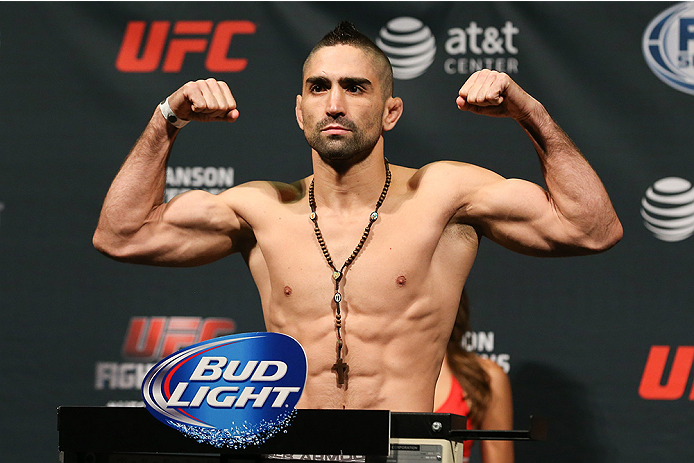 SAN ANTONIO, TX - JUNE 27: Ricardo Lamas steps on the scale during the UFC Fight Night weigh-in at the AT&T Center on June 27, 2014 in San Antonio, Texas. (Photo by Ed Mulholland/Zuffa LLC/Zuffa LLC via Getty Images)
