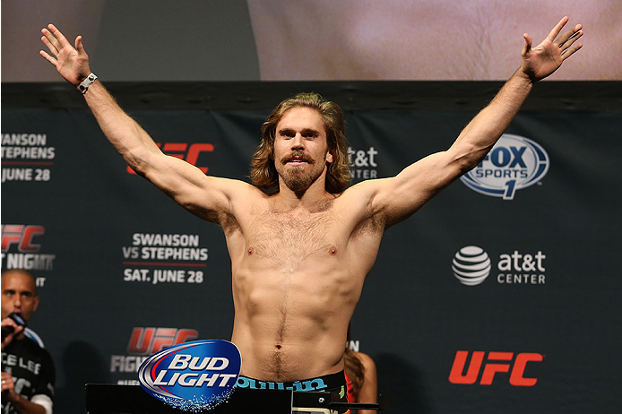 SAN ANTONIO, TX - JUNE 27: Andrew Craig steps on the scale during the UFC Fight Night weigh-in at the AT&T Center on June 27, 2014 in San Antonio, Texas. (Photo by Ed Mulholland/Zuffa LLC/Zuffa LLC via Getty Images)
