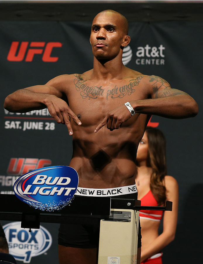 SAN ANTONIO, TX - JUNE 27: Nico Musoke steps on the scale during the UFC Fight Night weigh-in at the AT&T Center on June 27, 2014 in San Antonio, Texas. (Photo by Ed Mulholland/Zuffa LLC/Zuffa LLC via Getty Images)