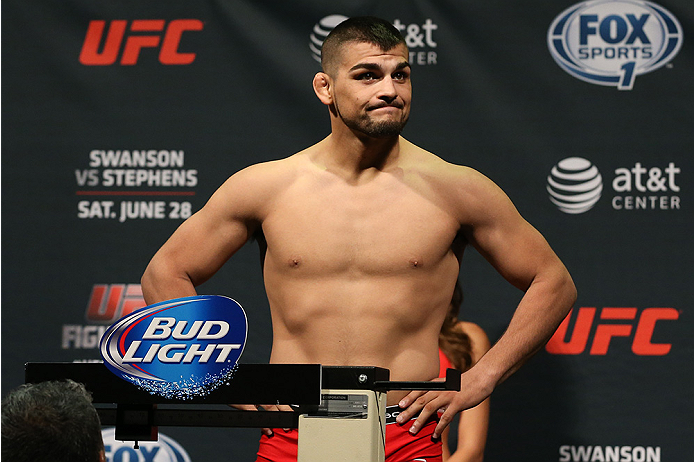 SAN ANTONIO, TX - JUNE 27: Kelvin Gastelum steps on the scale during the UFC Fight Night weigh-in at the AT&T Center on June 27, 2014 in San Antonio, Texas. (Photo by Ed Mulholland/Zuffa LLC/Zuffa LLC via Getty Images)