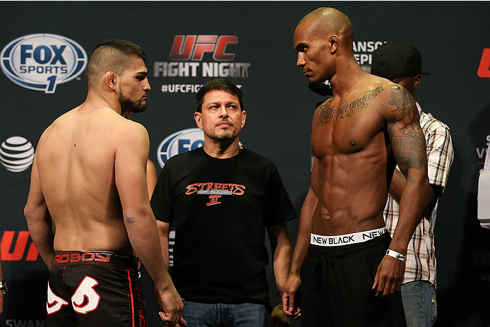 SAN ANTONIO, TX - JUNE 27: Kelvin Gastelum and Nico Musoke steps on the scale during the UFC Fight Night weigh-in at the AT&T Center on June 27, 2014 in San Antonio, Texas. (Photo by Ed Mulholland/Zuffa LLC/Zuffa LLC via Getty Images)